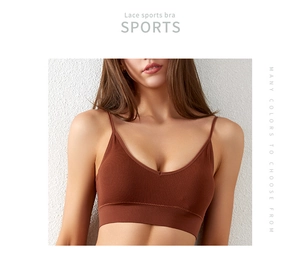 Detail of brown ribbed sports bra with deep V-neck and thin straps on model