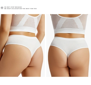 Detail of white mesh breathable seamless sports bra and thong set for fitness