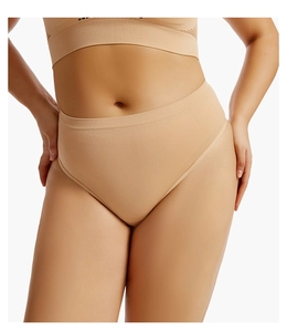 Detail of seamless nude thong showing high-elasticity knit texture and invisible edges