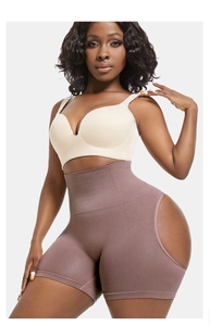 Detail of high waist shaping shorts with open butt design in dark mauve knit fabric
