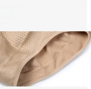 Detail showing breathable honeycomb knit fabric and seamless ribbed edge of body shaper