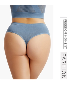 Detailed back view of seamless blue thong and sports vest with fine ribbed texture