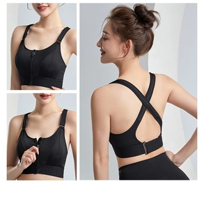 Dettaglio di un reggiseno sportivo nero con cerniera anteriore e spalline incrociate