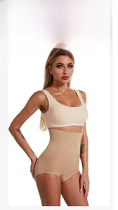 Detailed model view of a nude high-waist tummy control shapewear set with firm compression