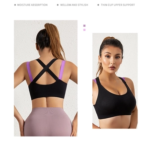Detail of black and purple sports bra showing moisture-wicking fabric and dual back straps
