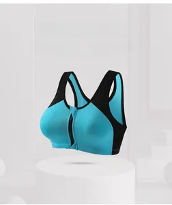 Detailed view of the front zipper and breathable mesh fabric on this teal sports bra