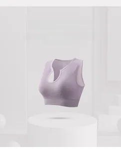 Detailed view of the light purple ribbed sports bra with wide elastic hem and U-neck design