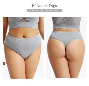 Front and back view of gray seamless ribbed thong for fitness and yoga activities