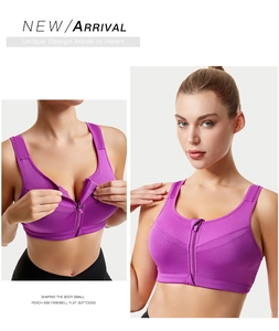 Detailed close-up of the front zipper closure and high-support fit on the purple sports bra