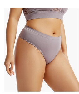 Detail of seamless purple-grey sports thong with wide elastic waistband and fine texture