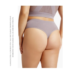Detail view of purple seamless high-stretch sports thong with mesh cutout design