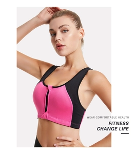 Detailed view of pink and black sports bra with front zipper closure for high support