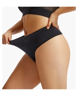 Close-up of black seamless women's panty showing high elastic stretch and fabric detail