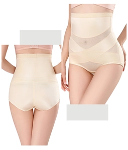 Détail du contrôle abdominal taille haute et du panneau respirant en maille alvéolée