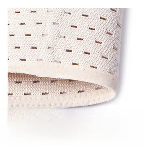 Detail of breathable mesh fabric and precise zig-zag stitching on waist trainer belt