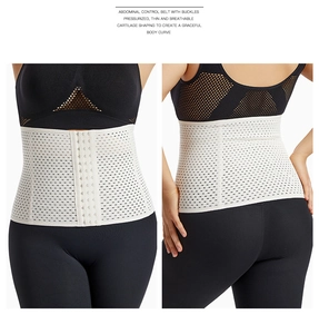 Detail of white waist trainer with multi-row hook closure and breathable mesh fabric
