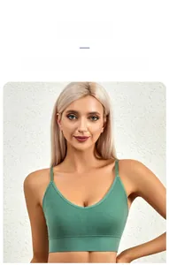 Detail of green ribbed knit sports bra featuring wide underband and thin V-neck straps