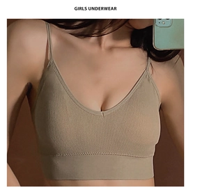 Close-up of beige ribbed wireless bra top with thin straps and V-neckline detail