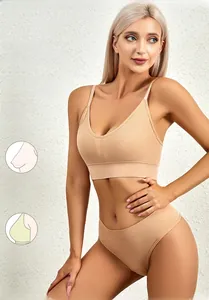 Detail of seamless push-up bra and panty set with ribbed knit texture in beige color