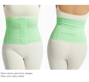 Detail of light green breathable mesh waist trainer with three-row hook-and-eye closure