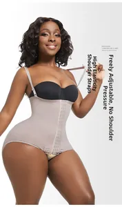 Detail of high-stretch fabric and three-row hook-and-eye waist closure for shaping
