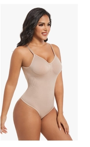 Detail of nude seamless bodysuit showing V-neck design and tummy control fabric texture