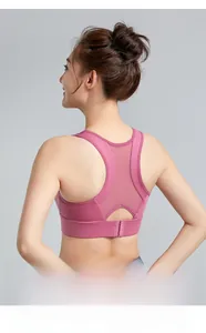 Detailed back view of pink sports bra featuring breathable mesh and heart cutout detail