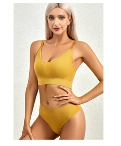 Macro detail of ginger seamless ribbed bra set with V-neckline and elastic texture