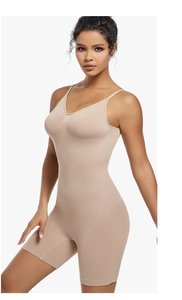 Detail view of seamless nude shapewear bodysuit showing slimming compression and fabric texture