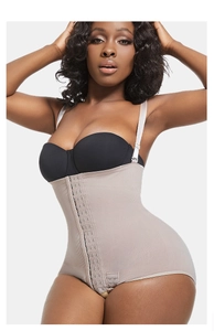 Detail view of adjustable straps and triple-row hook closures on nude shapewear bodysuit