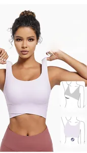Close-up of light purple sports bra featuring wide crisscross hem for stable support