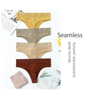 Detailed set of four seamless panties in autumn tones with wide elastic waistband