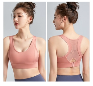 Pink wireless yoga bra featuring breathable mesh racerback and adjustable back closure