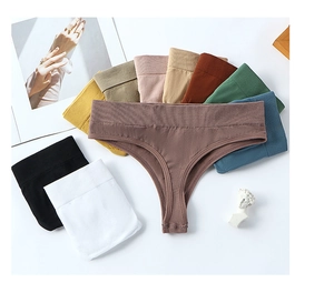 Macro view of seamless knitted thongs in multiple colors with ribbed elastic waistband
