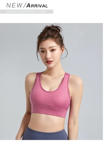 Macro detail of magenta wireless sports bra with wide straps and high-elastic fabric