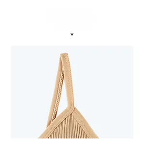 Detail of camel rib-knit camisole showing thin shoulder straps and neat stitching