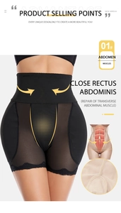 Detail view of high-waisted shaping shorts with mesh panels and lace trim for tummy control