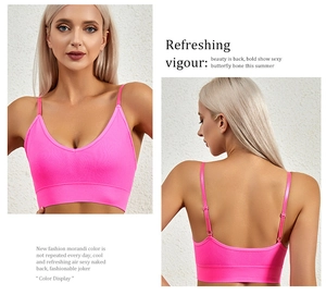 Deep V-neck seamless neon pink wireless bra set with adjustable straps and open back detail
