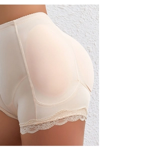 Détail de la gaine rembourrée à taille haute avec dentelle et coutures renforcées