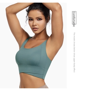 Detail of cross-over hem design on this high-elastic yoga sports bra in sage green