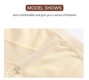 Gros plan sur le tissu en maille beige hautement élastique et les coutures sans couture