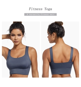 Detail view of seamless high-impact sports bra featuring front cross hem and open back design