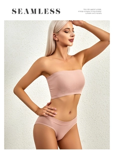Detail of seamless ribbed pink tube top and panty set showing high elasticity and fabric texture