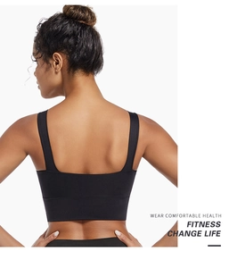 Close-up of black sports bra featuring a square back design and wide straps for support