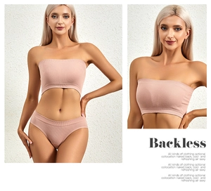 Macro detail of seamless ribbed backless lingerie set in light pink elastic fabric