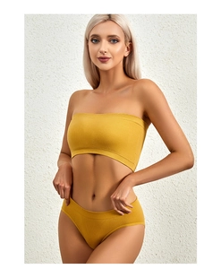 Detail of ginger yellow ribbed seamless lingerie set with strapless bandeau and matching brief