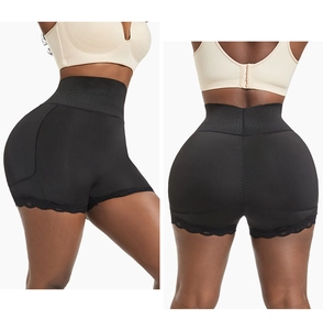 Détail de gaine amincissante noire taille haute avec dentelle et contrôle du ventre