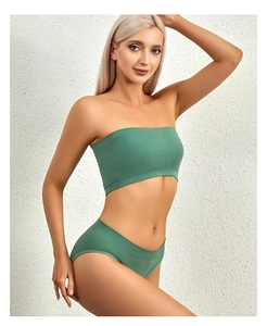 Detail view of green ribbed knit seamless bralette and matching panty set for women