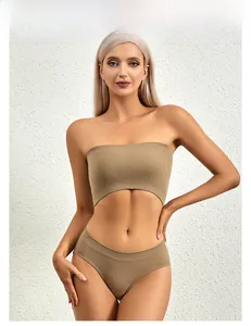 Close-up of ribbed seamless bra set in camel color featuring a curved hem design