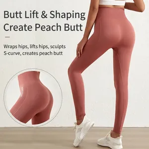 Hoge taille yoga legging in oudroze met naadloos liftend ontwerp en logo op de zijkant